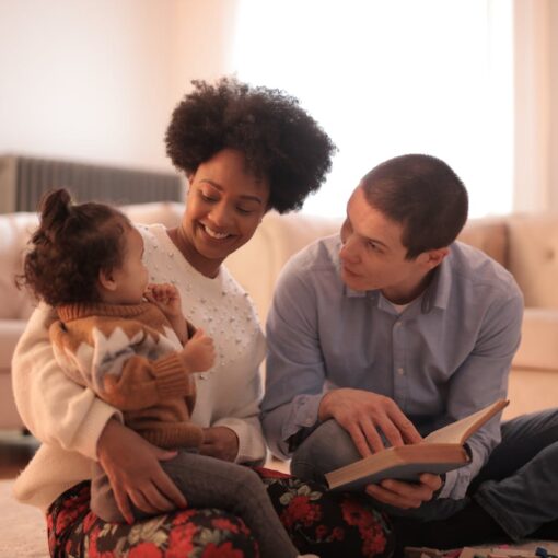 photo-of-man-and-woman-having-fun-with-their-baby