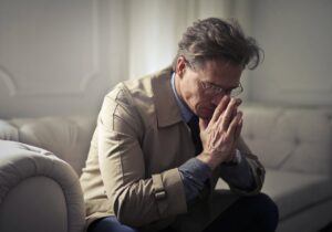 sad person in living room