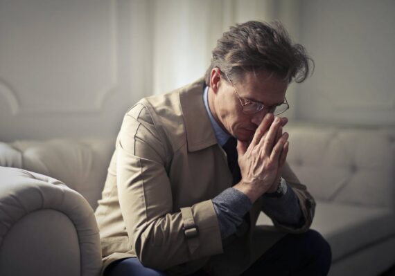 sad person in living room