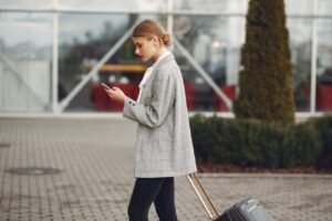 woman-in-gray-coat-and-black-pants
