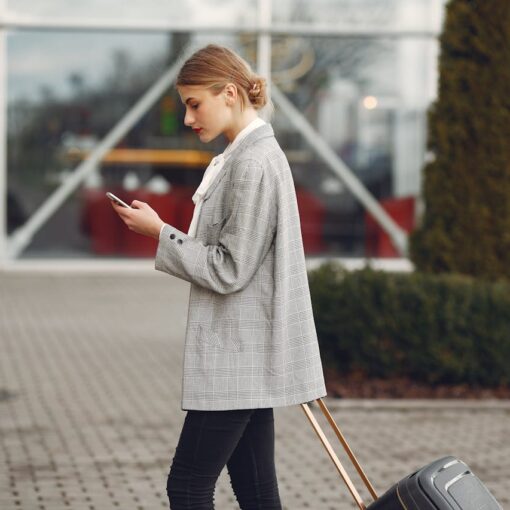 woman-in-gray-coat-and-black-pants