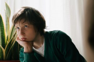 kid-in-green-and-white-crew-neck-long-sleeve-shirt