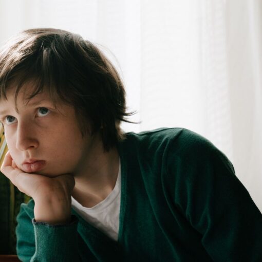 kid-in-green-and-white-crew-neck-long-sleeve-shirt